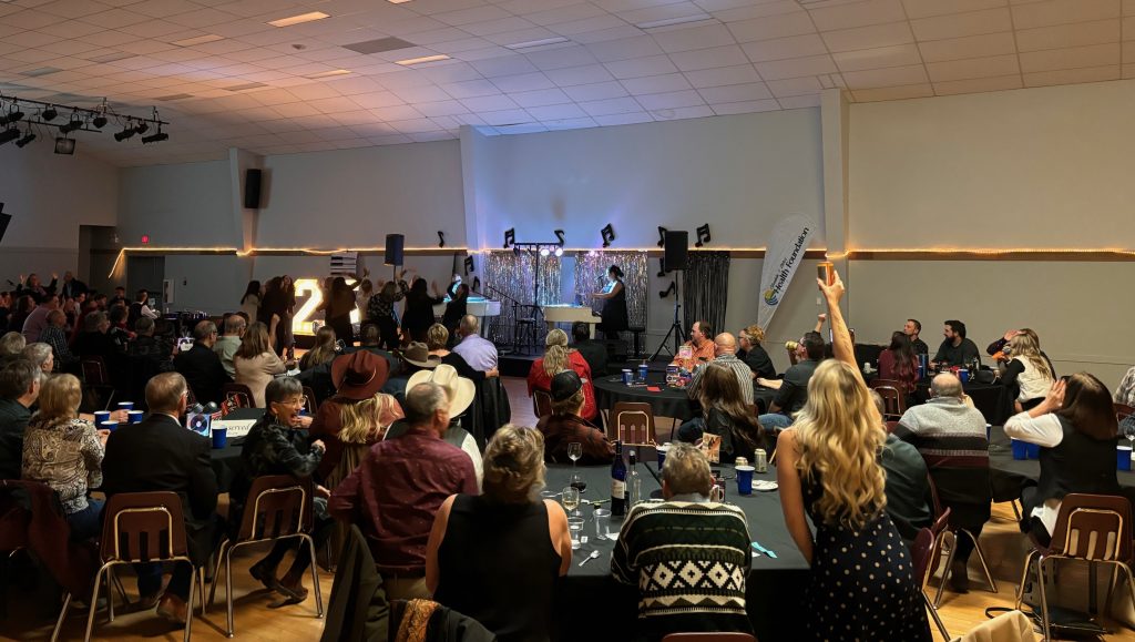 The crowd enjoying the musical performance
